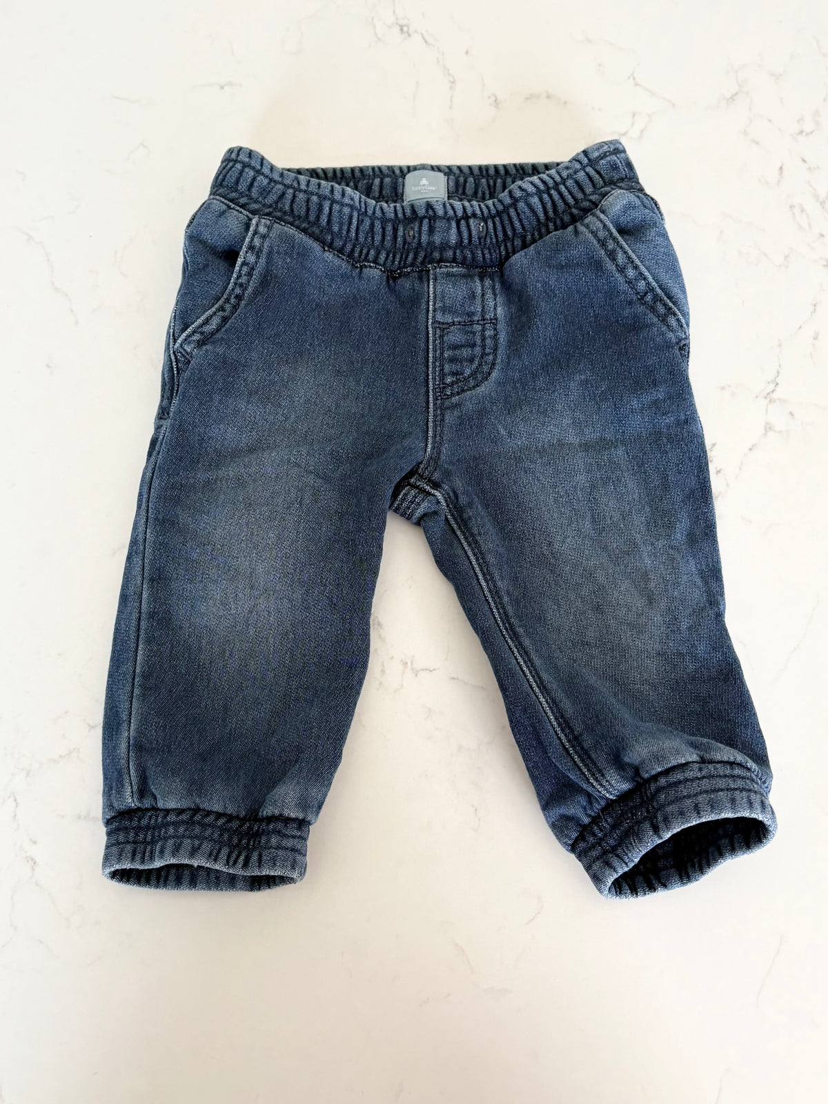 Gap-Jogger-6/12 mois ( manque cordon)