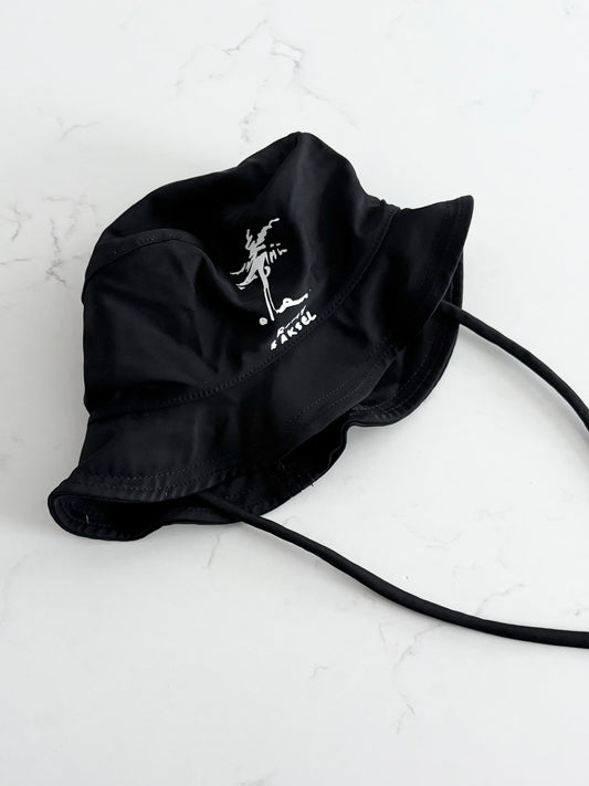 Romy & aksel-chapeau piscine-~6/12 mois