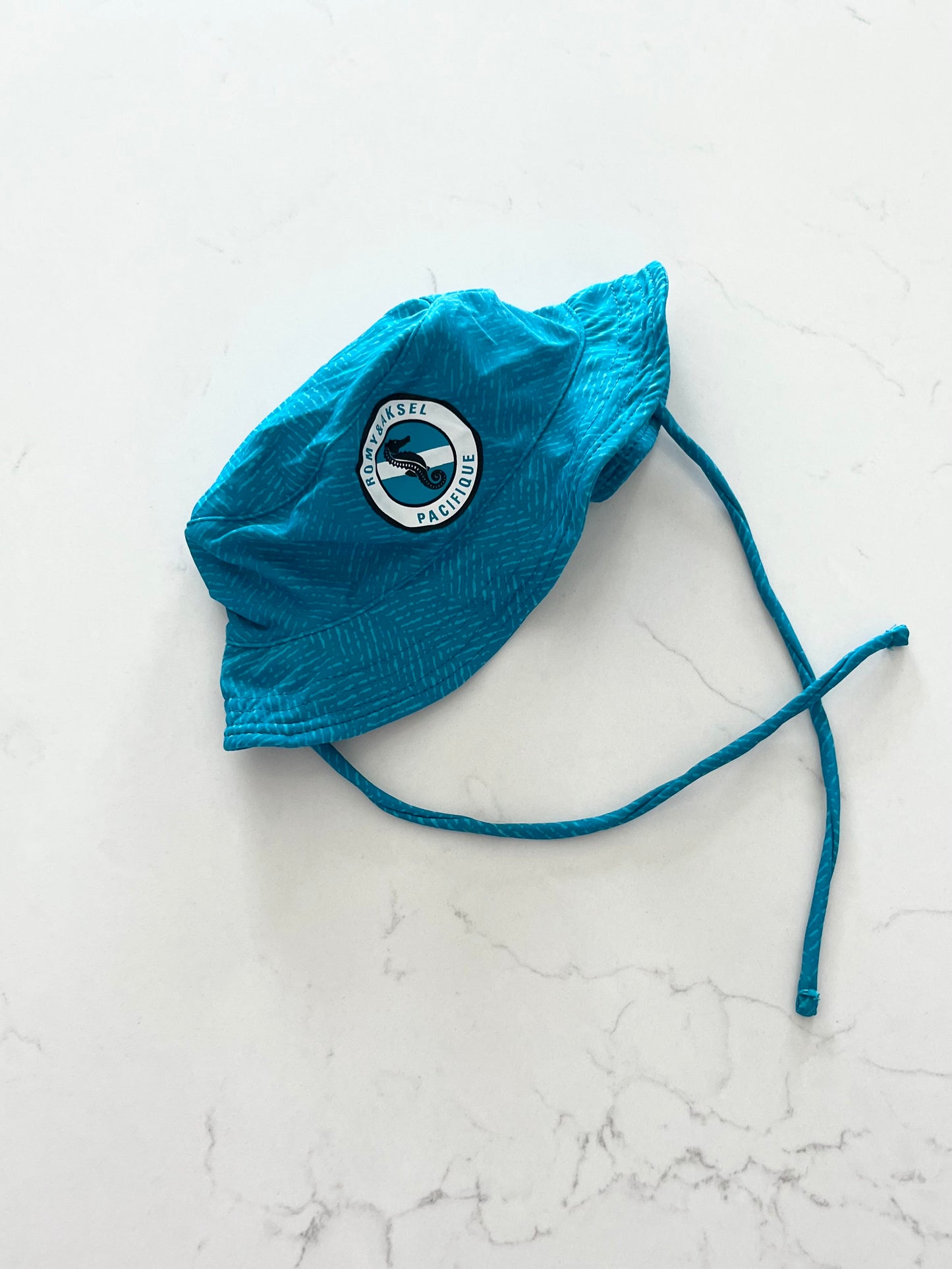 Romy & Aksel-Chapeau de piscine-12/24 mois