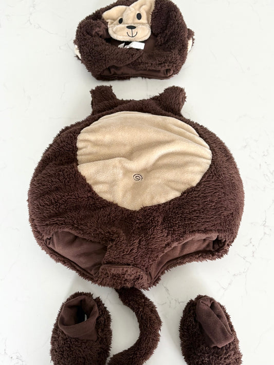 Costume singe- corps 6/12 mois , tête + pantoufles écrit 12/18 mois