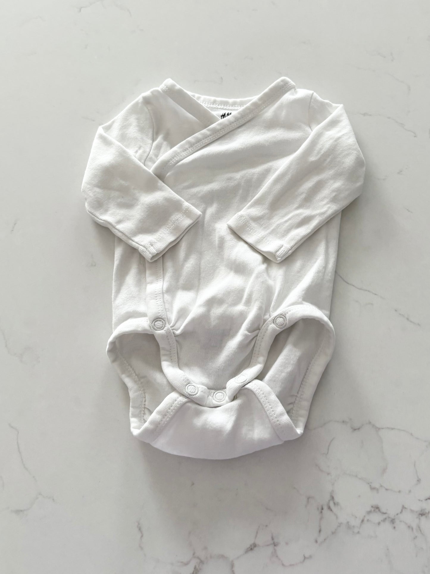H&M-Cache couche-1/2 mois