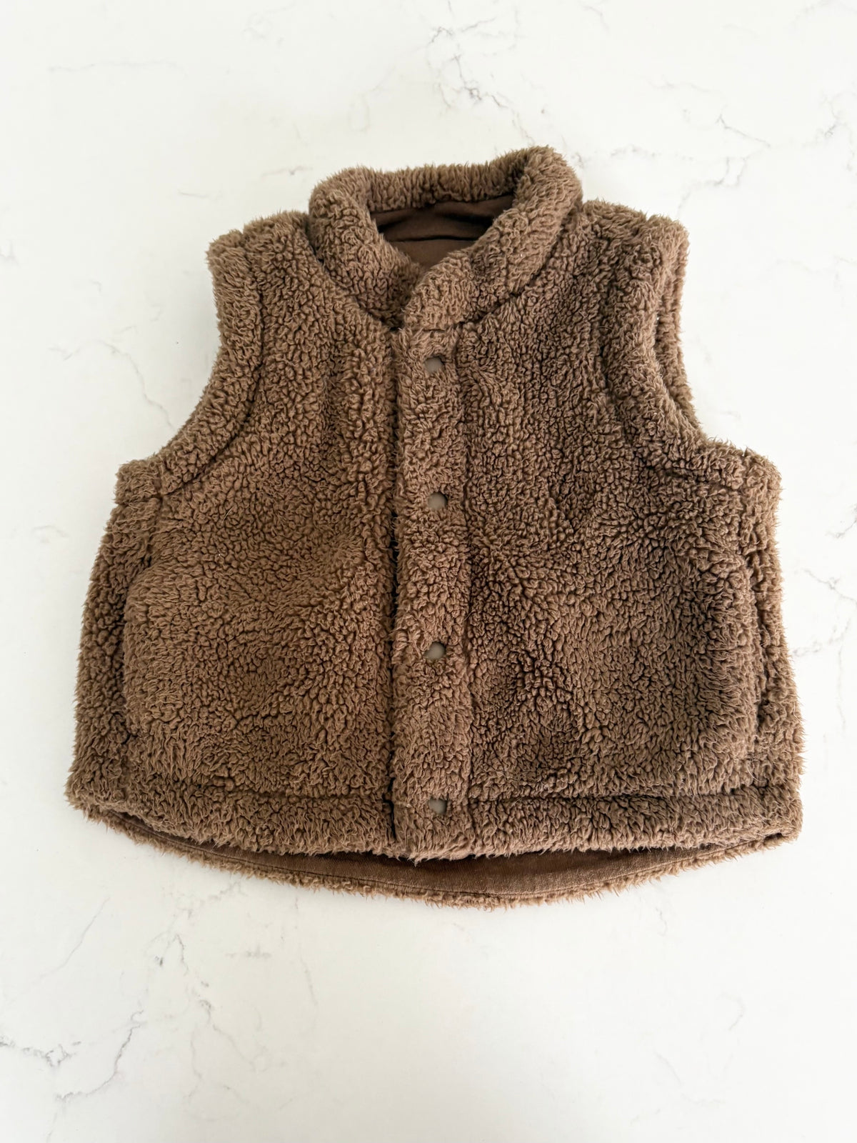 Uniqulo-Veste polar sans manche-12/18 mois