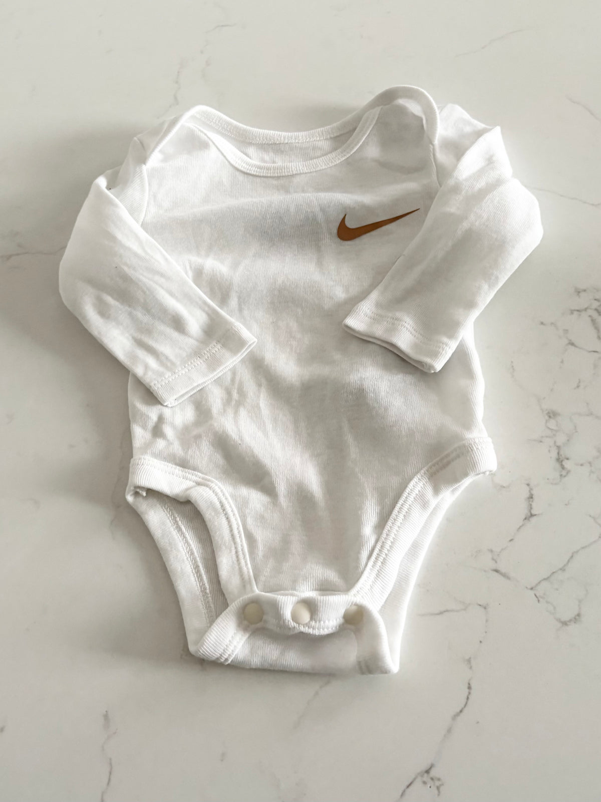 Nike-Cache couche-3 mois