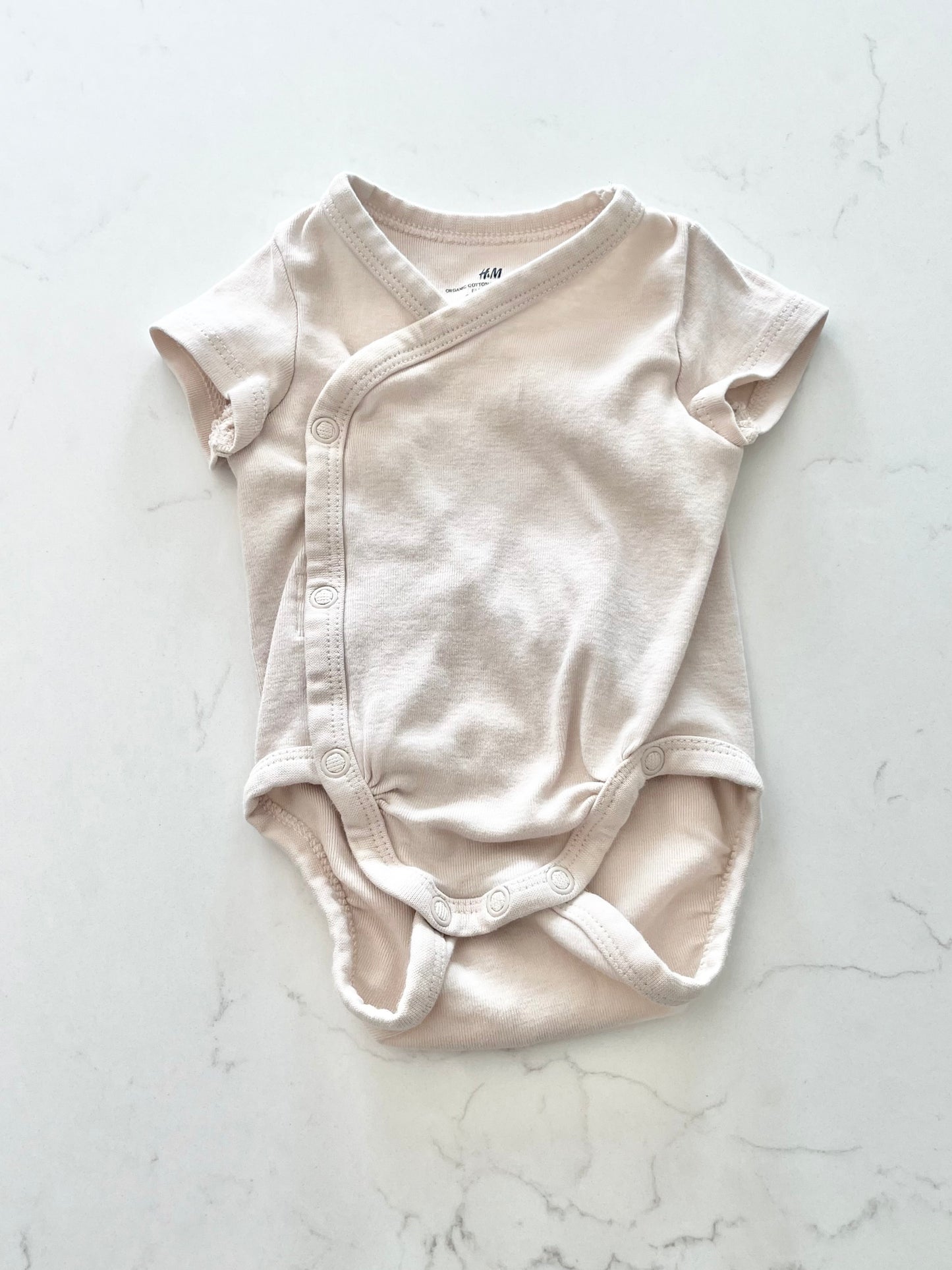 H&M-Cache couche-1/2 mois