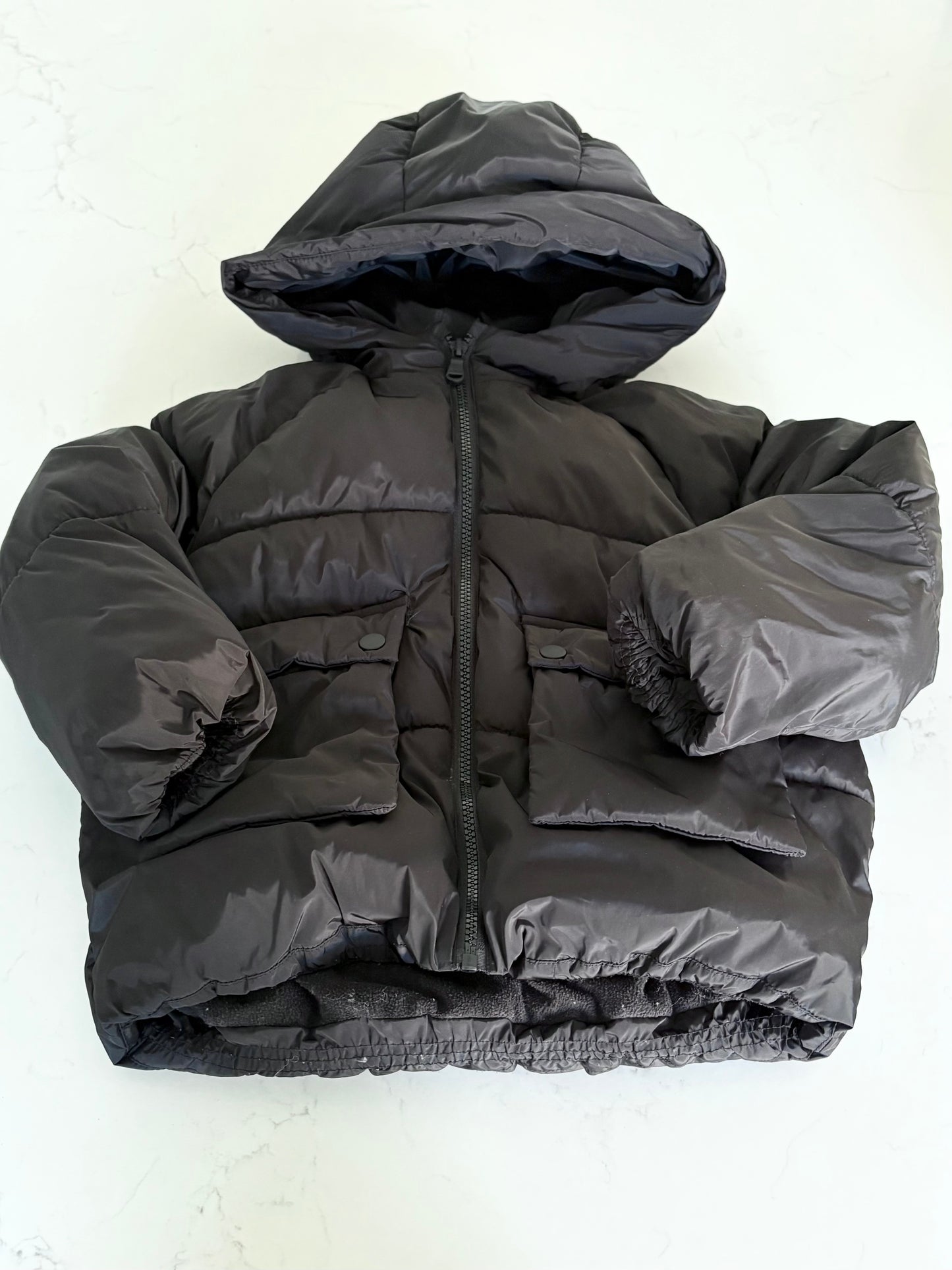 Zara-Manteau matelassé-7T ( réparation faite près de la poche)