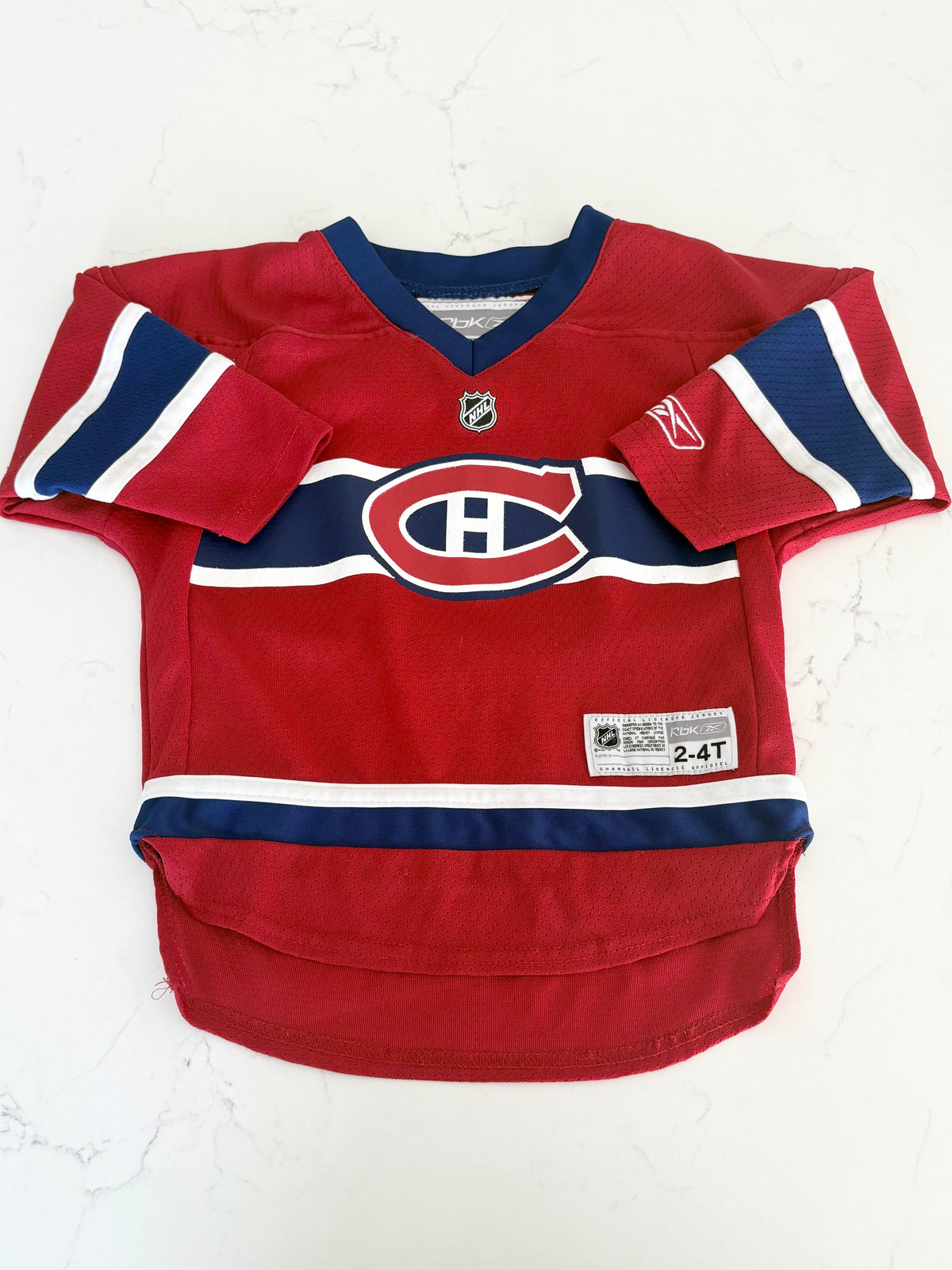 Reebook-Jersey canadien-2/4T (très léger accros )